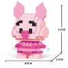 A pink rabbit figurine made of micro building blocks, showing its size and detail.