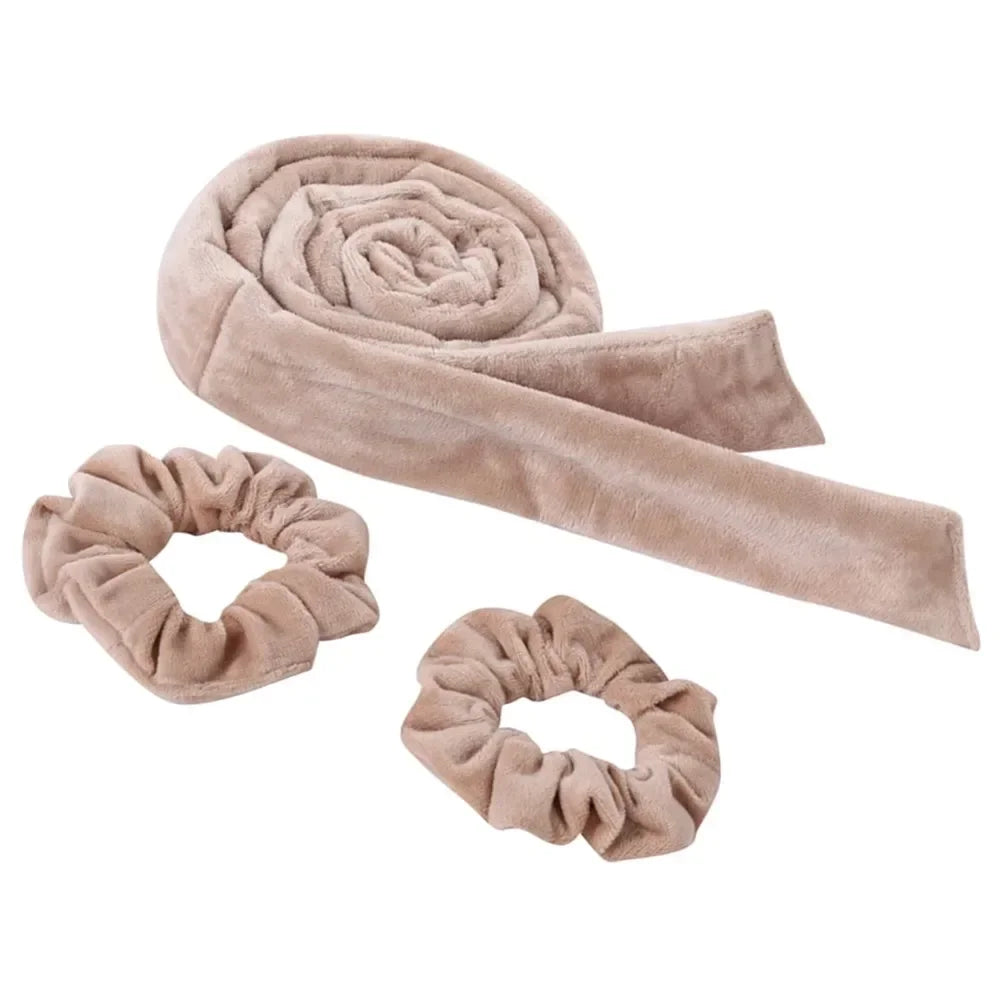 A beige heatless curling rod headband rolled into a spiral and a separate looped band.