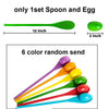 A set of six colored wooden spoons and eggs for a race game.