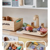 A wooden pretend play food cutting set featuring various fruits and vegetables for children's play.