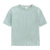 A light mint green kids summer tracksuit set top with short sleeves and shorts.