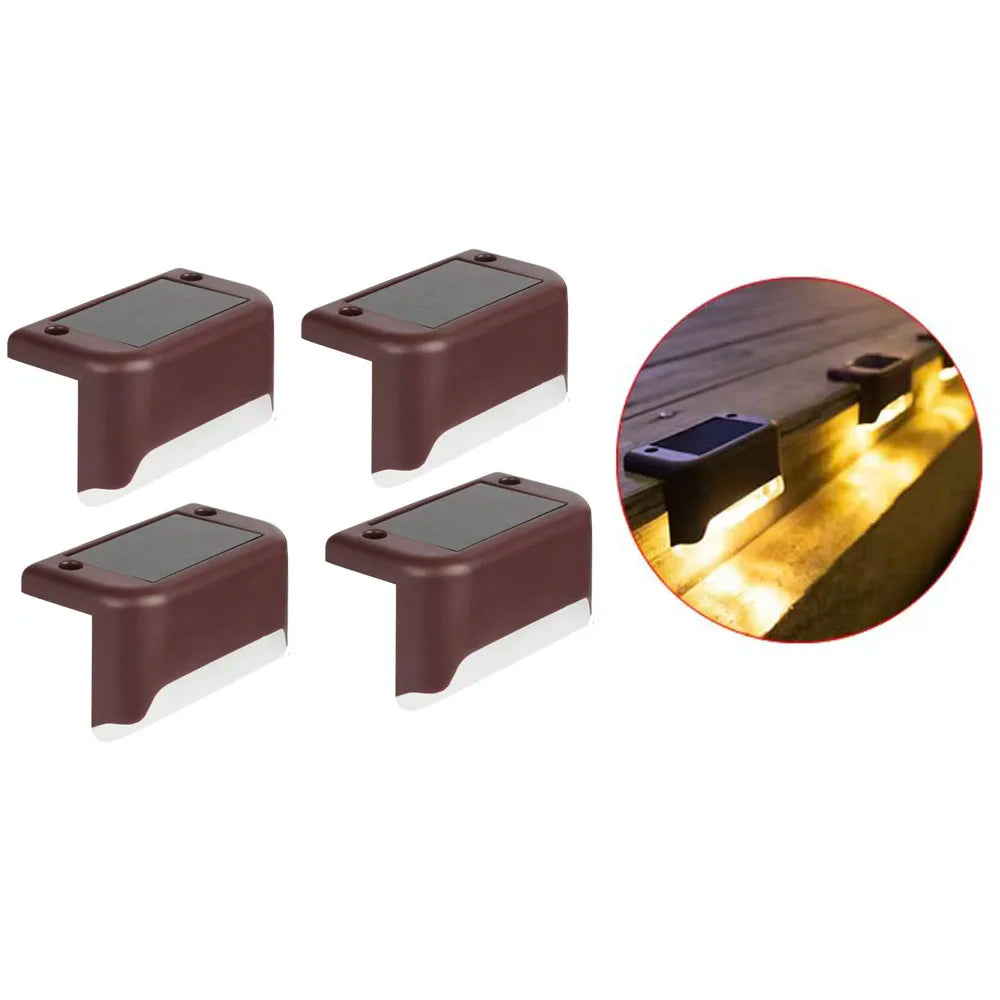 Four dark brown solar powered deck lights designed for outdoor steps, patio, and pathway lighting.
