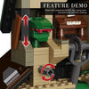 A LEGO building block featuring a green figure and a mechanism for simulating up and down shaking.