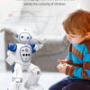 A child is interacting with a white robot toy that has gesture control features.