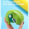 A hand holds a lime green kids shark clog sandal, highlighting its soft and comfortable design.
