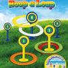 A colorful ring toss game set with five numbered rings and stakes placed on green grass under a blue sky.