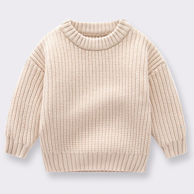 A beige knitted long-sleeve pullover sweater for kids.