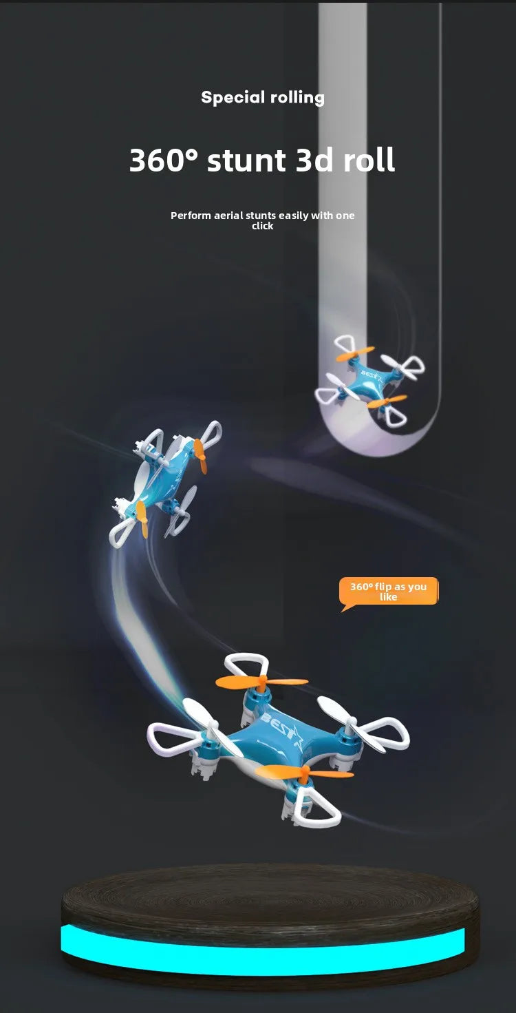 A blue mini drone performing a stunt roll on a dark surface.