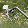 A close-up of a durable and sturdy 4-tine ergonomic hand weeder tool with a metal handle and sharp tines in grass.
