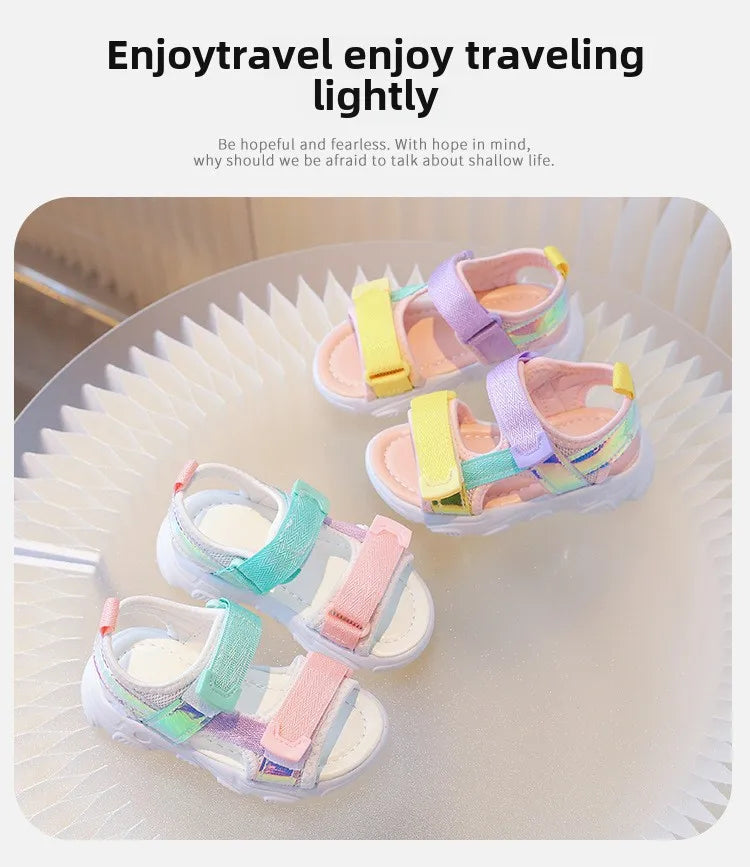 A collection of colorful kids' breathable princess sandals displayed on a white plate.