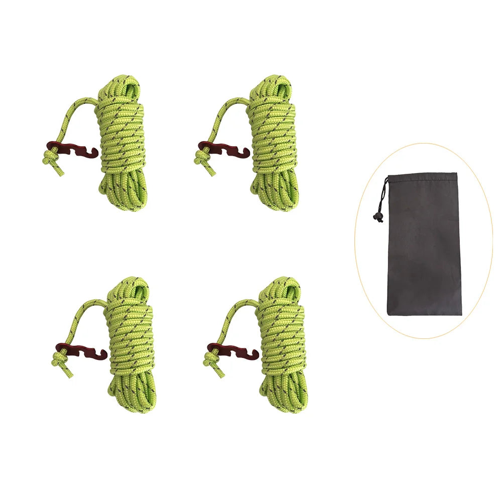Four bundles of green reflective camping guy lines with aluminum tensioners shown next to a black pouch.
