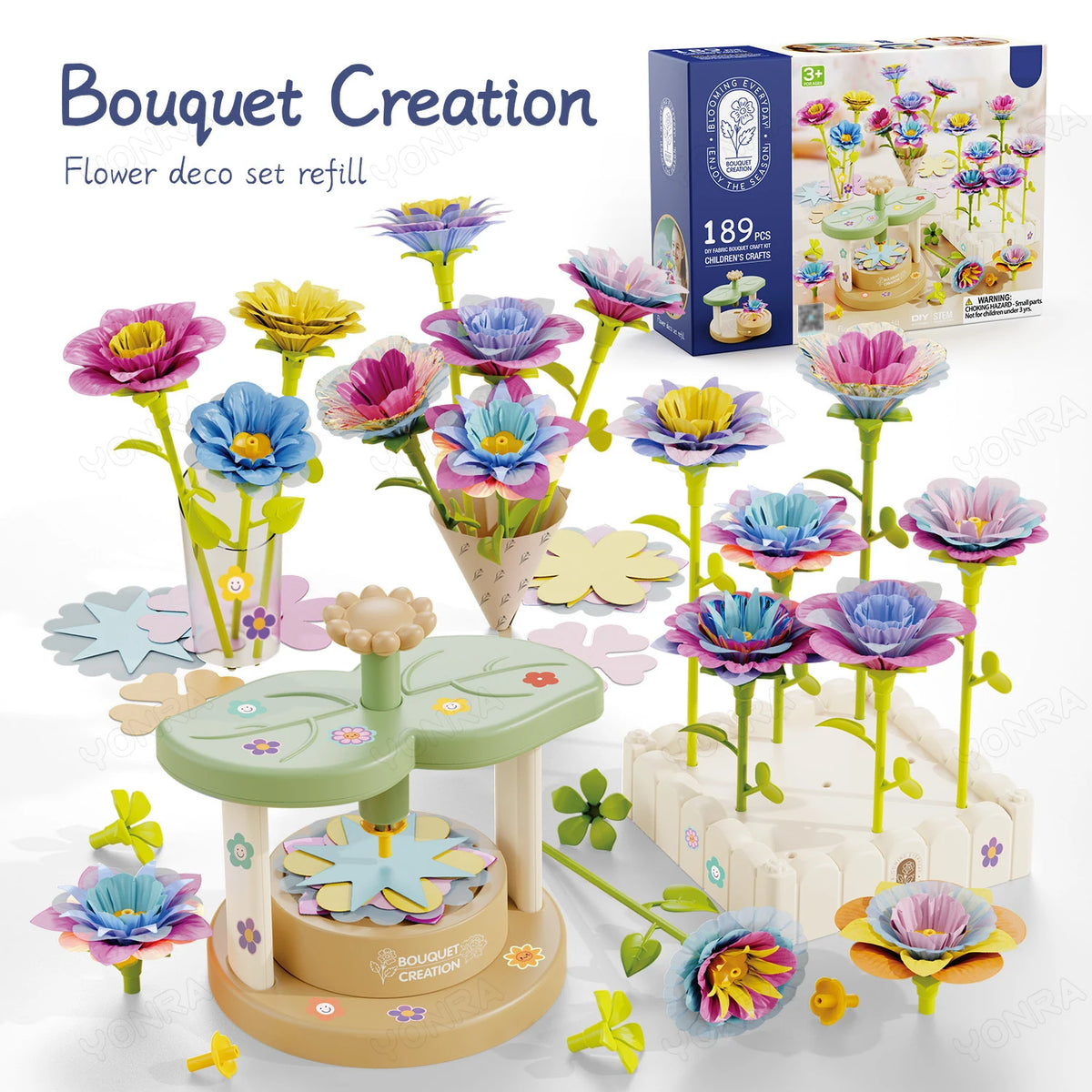 Fargerikt håndverkssett med diverse stoffblomster og tilbehør for å lage en bukett.