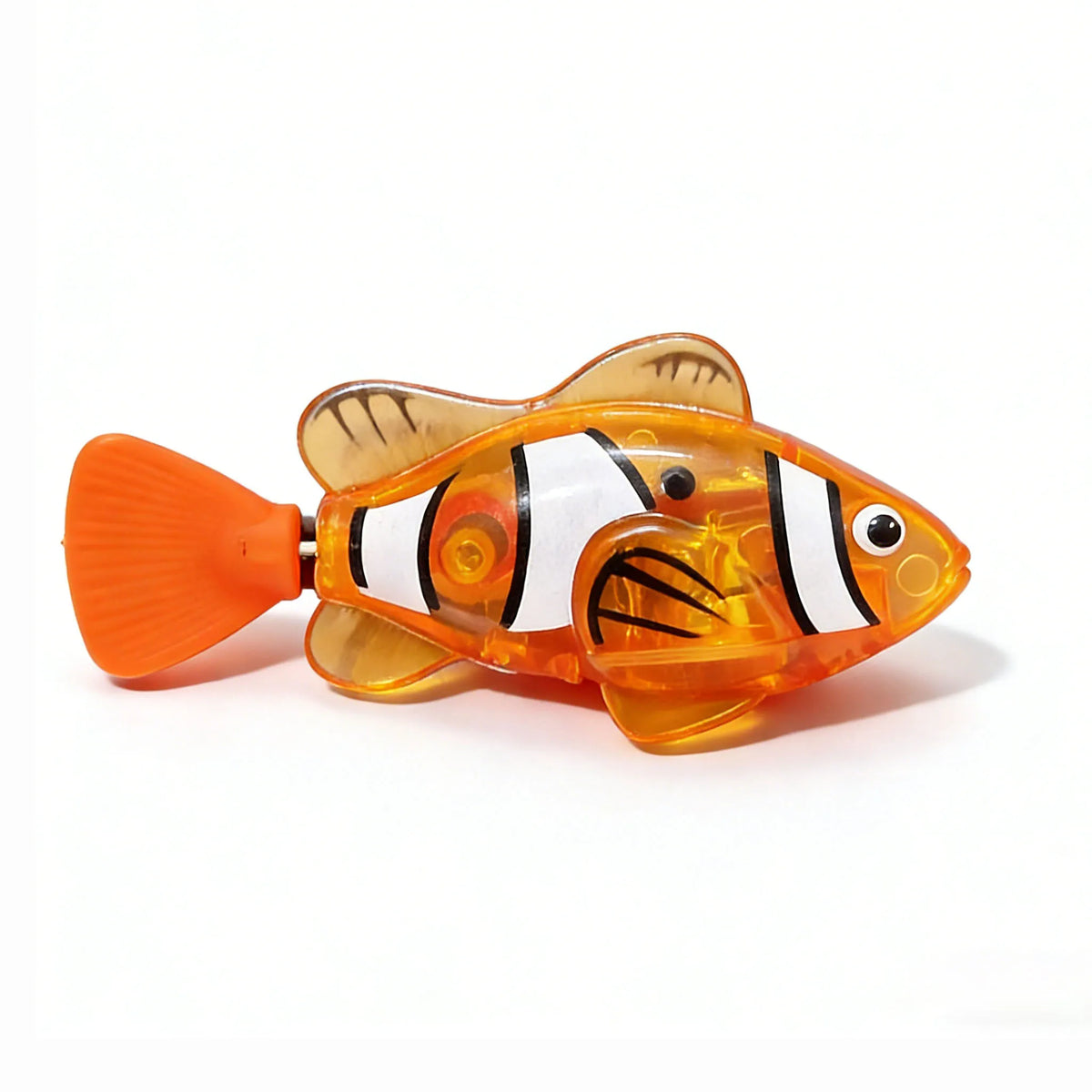An orange plastic clownfish toy with a translucent body and an orange fin.