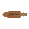 A pair of matte resin side hair clips in a tan or nude color.