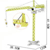 A yellow diecast construction tower crane model with an excavator and loader set shown in a vertical display.