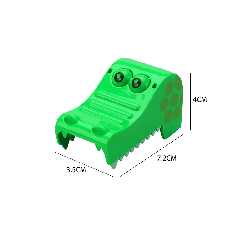A bright green marble run building block set with tracks and funnels shown from above.
