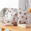 A set of reusable waterproof wet and dry bags featuring brown bear designs for swimwear and diapers.