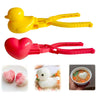 Yellow and red duck-shaped rice molds used for making fun sushi and snowballs