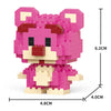 A pink and red micro building block figurine of a bear, showing its dimensions.