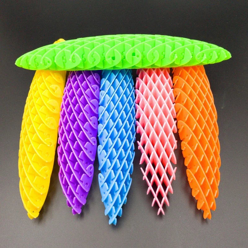 Set de juguetes antiestrés tipo gusano 3D estirables en amarillo, morado, azul, rosa y naranja.