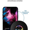 A black Bluetooth speaker is shown next to a smartphone displaying music, illustrating 10m transmission distance.