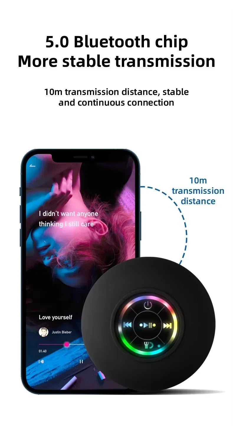 A black Bluetooth speaker is shown next to a smartphone displaying music, illustrating 10m transmission distance.