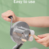 Hands are using a Cavatelli maker machine to roll out fresh pasta dough onto a cutting board.