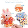 A wooden lacing and knotting set with pink rabbit and blue elephant shapes for teaching babies to tie shoelaces.
