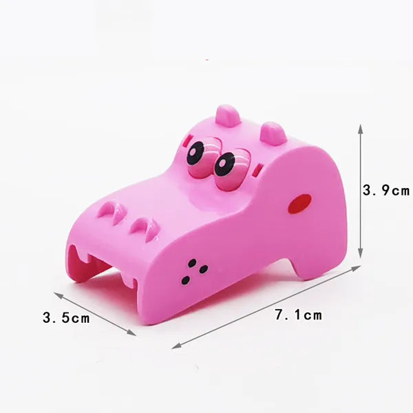 A pink marble run building block set with tracks and funnels shown from the side.