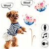 A fluffy dog is interacting with a plush pig toy that makes woof sounds and music.
