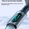 A close-up of a silver USB to Type-C charging cable with an LED digital display showing 120W power output resting on snow.
