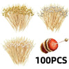 A collection of 100 pearl bamboo skewers for appetizers and desserts