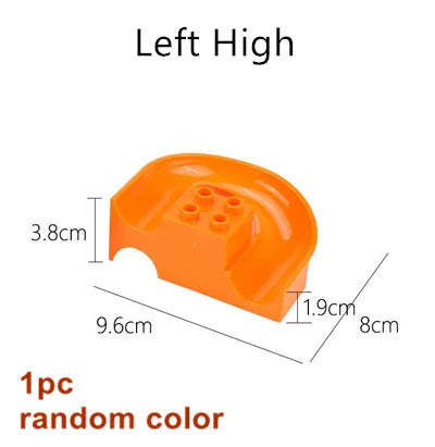 An orange Left High marble run building block piece with dimensions 3.8cm by 9.6cm.