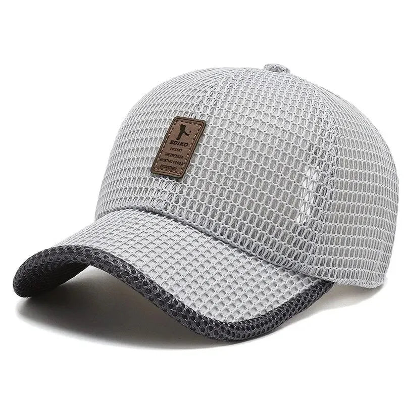 A light gray mesh baseball cap with a dark patch on the front, shown from above.