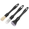 A set of black detailing brushes with natural hair bristles for cleaning interior and exterior surfaces.
