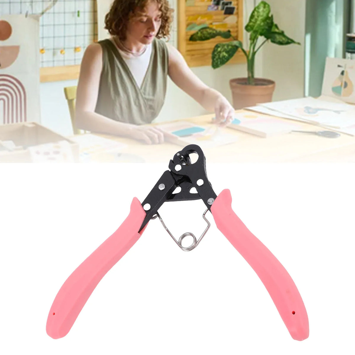 A pair of pink wire looping pliers used for jewelry making