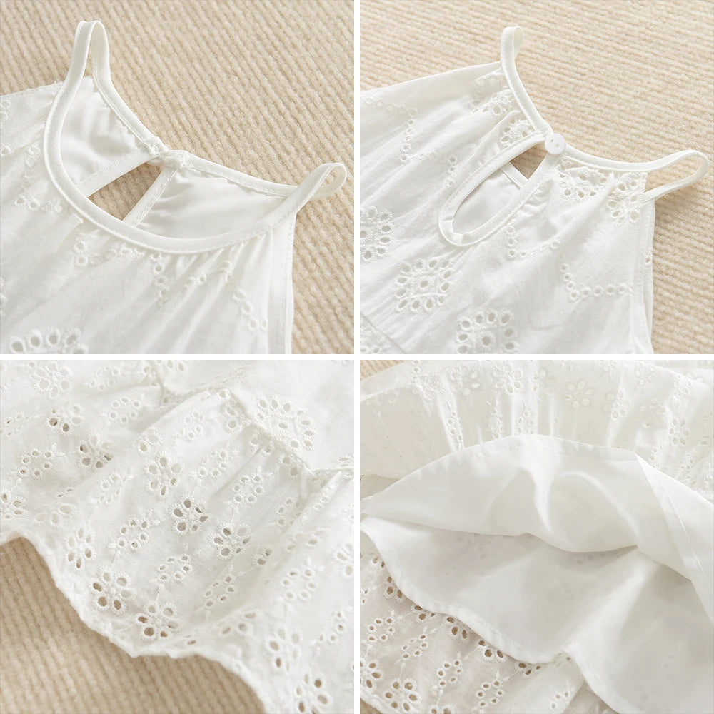 White cotton dress with lace detailing and suspender straps for a toddler girl