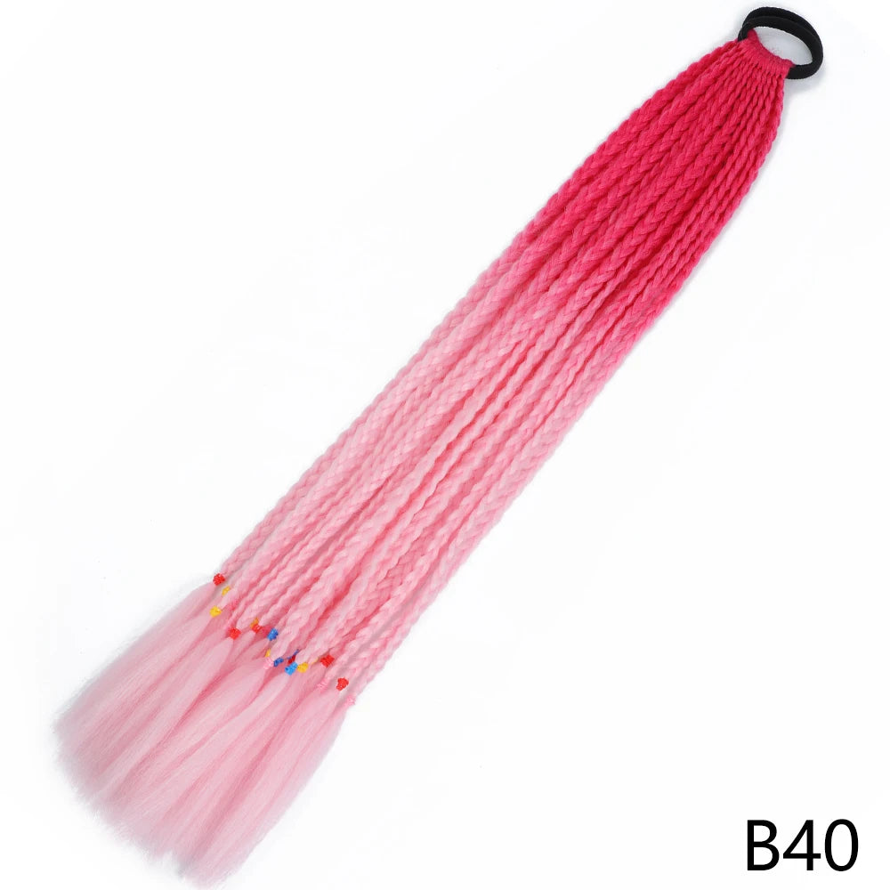 A pink gradient pre-braided ponytail extension with an elastic band.