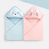 A pair of hooded baby bath towels, one light blue with a bunny face and one pink with a cat face.