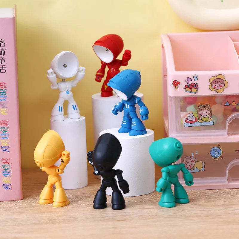 A collection of cartoon hero police night lights, including a red figure, a blue figure, and yellow and black figures, displa