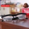 A pair of black adjustable degree eyeglasses resting on a wooden surface.