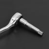 A chrome steel socket extension bar with a drive mechanism is shown against a dark background.