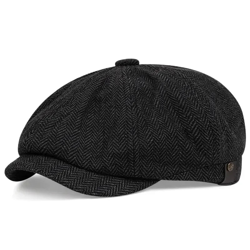 Black vintage retro newsboy cap with a textured fabric and a folded brim.