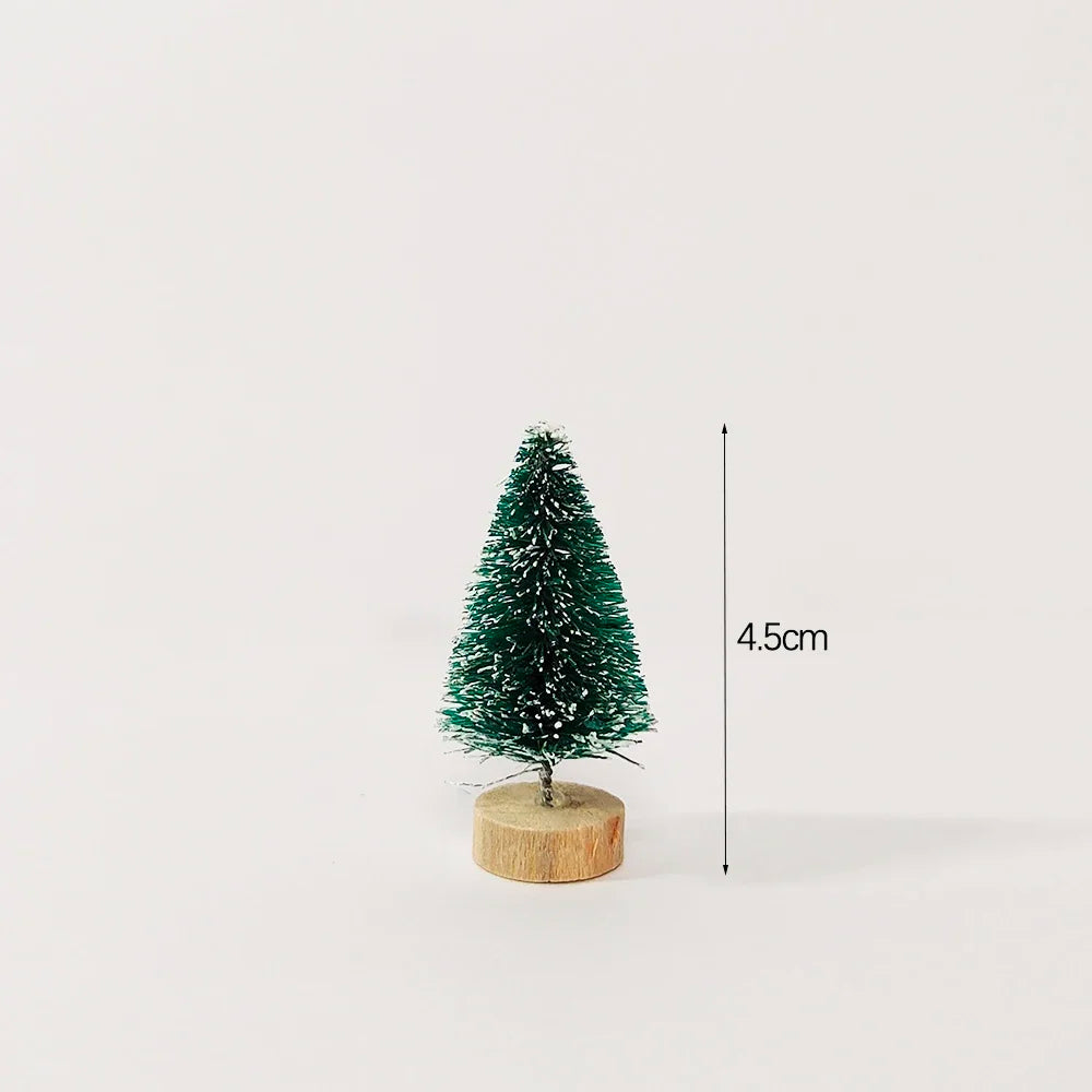 Lille kunstigt stedsegrønt juletræ med træsokkel og målestok, der viser 4,5 cm højde.