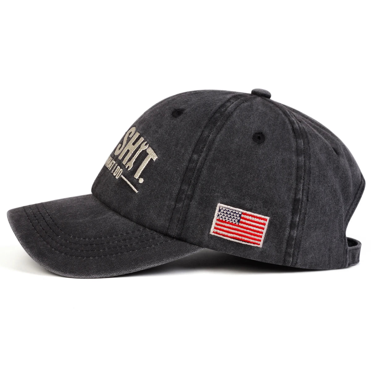A dark gray embroidered baseball cap featuring the text SHIT and an American flag patch.