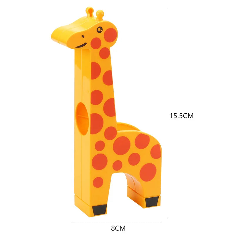 A yellow giraffe-shaped marble run building block toy with tracks and funnels.