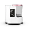 A white electric makeup brush cleaner with a clear container and pink accents.