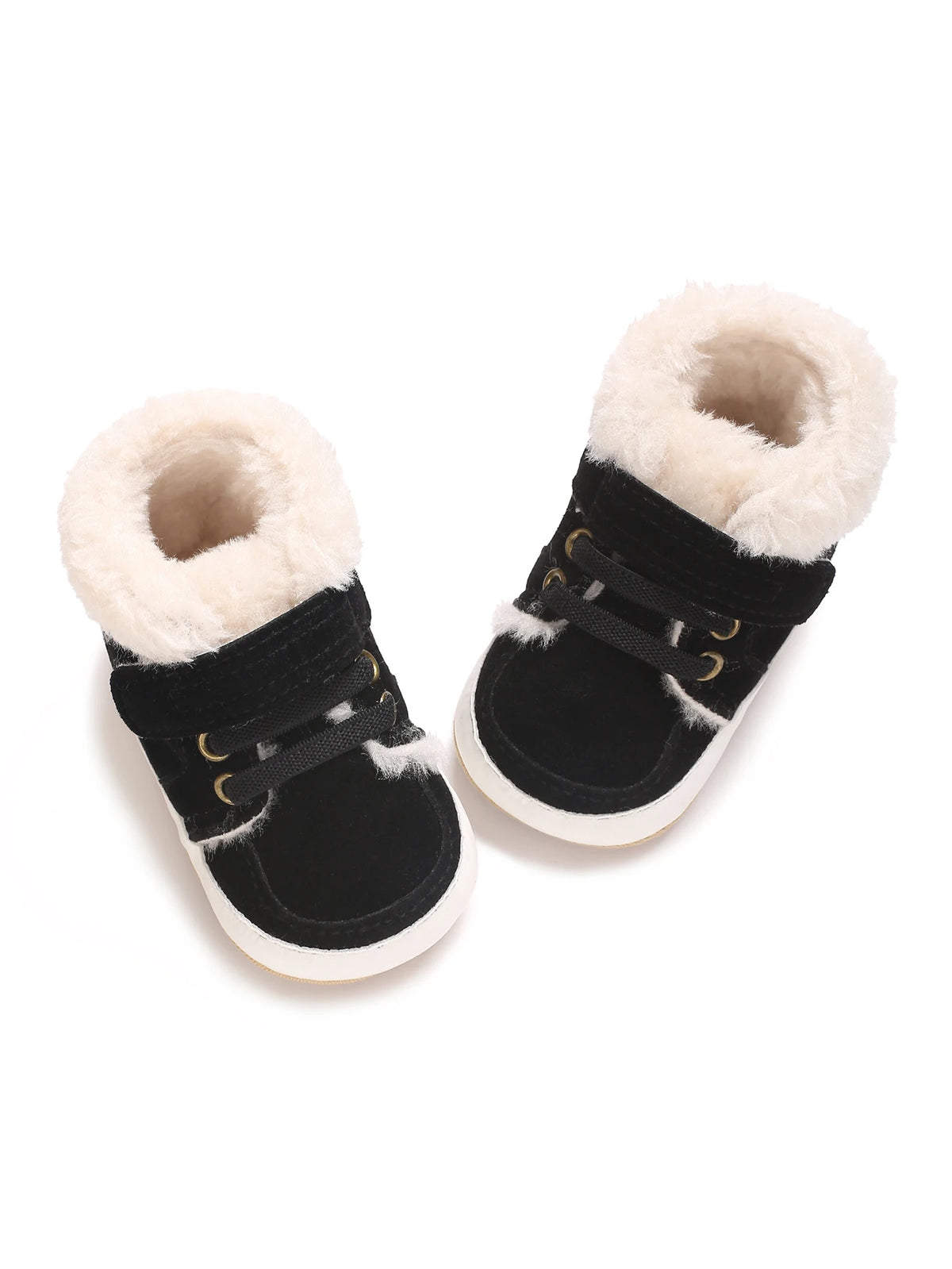 A pair of black baby winter snow boots with light beige faux fur lining and gold hardware.