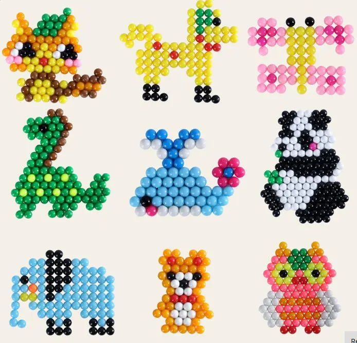 A collection of colorful water beads in various shapes and colors, including animal figures and abstract designs.