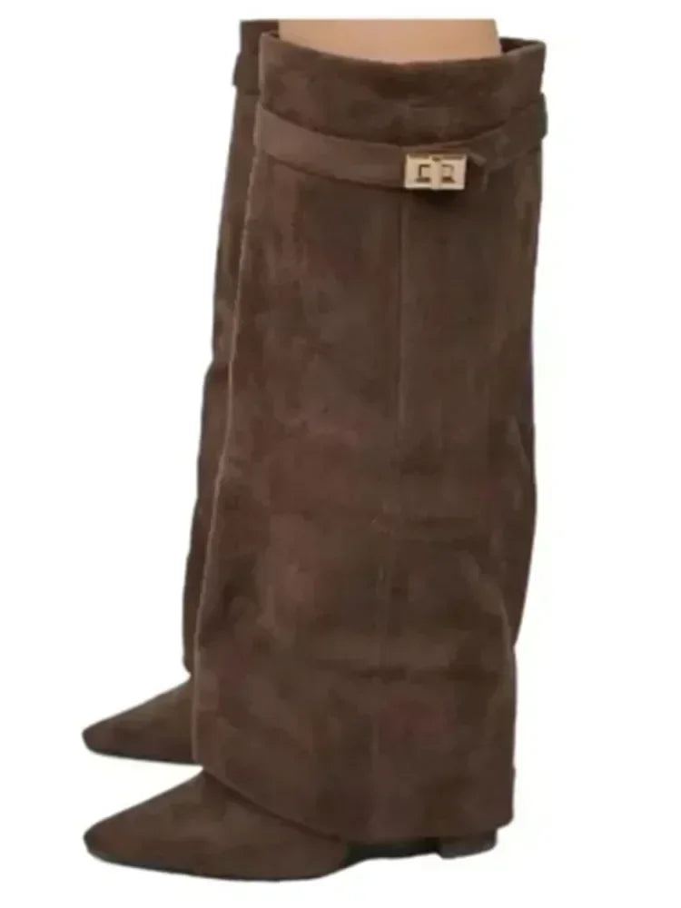 A pair of brown suede knee-high boots with a chunky heel and a metal buckle.